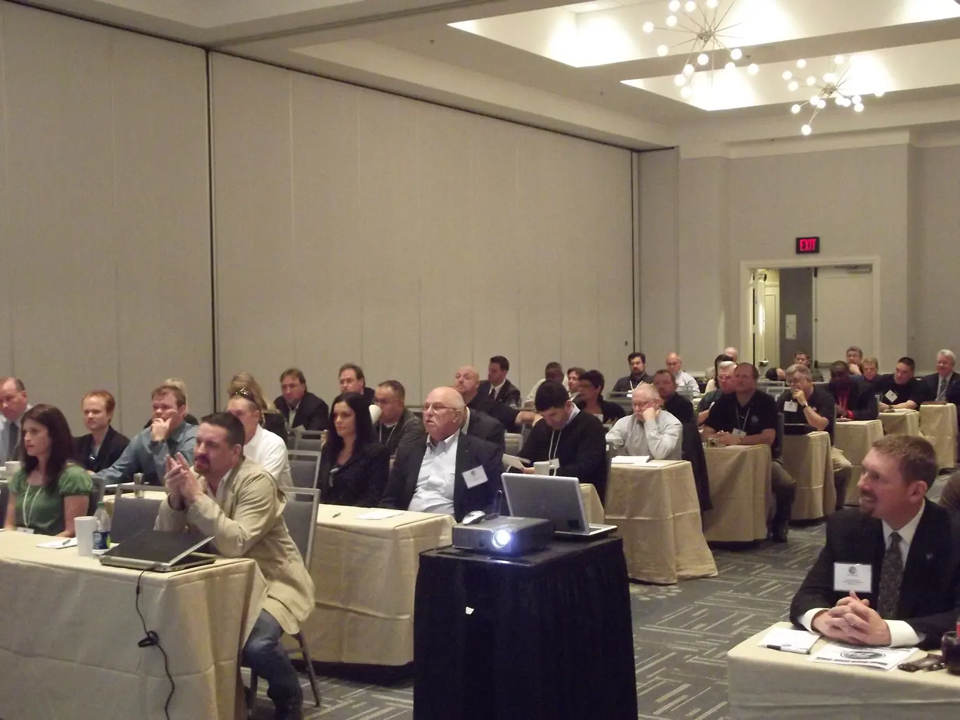 A room full of executive protection business owners at a conference